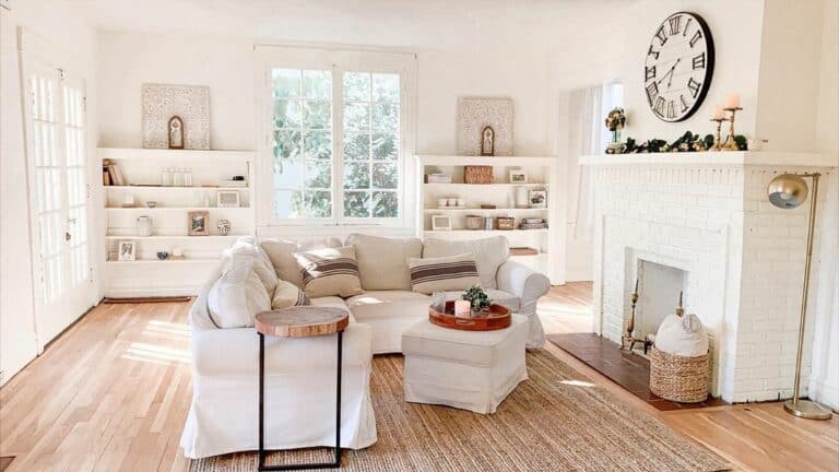 Farmhouse Living Room With White Brick Fireplace