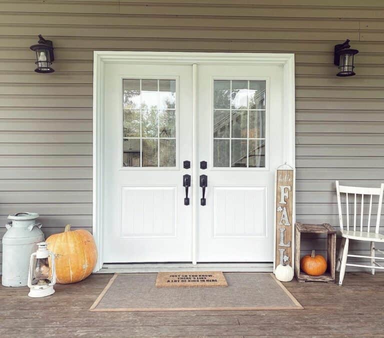 Farmhouse Porch With Double White Doors