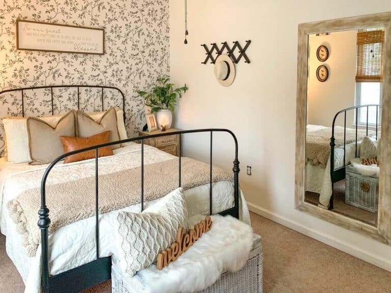 Floral Wallpaper and Wood-framed Mirror in Bedroom