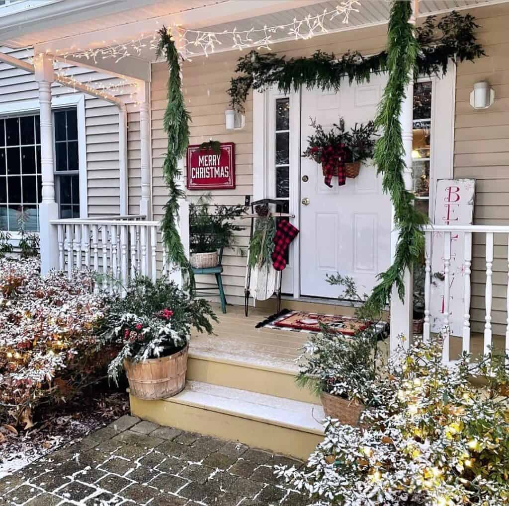 Front Porch With Christmas Pine Garland