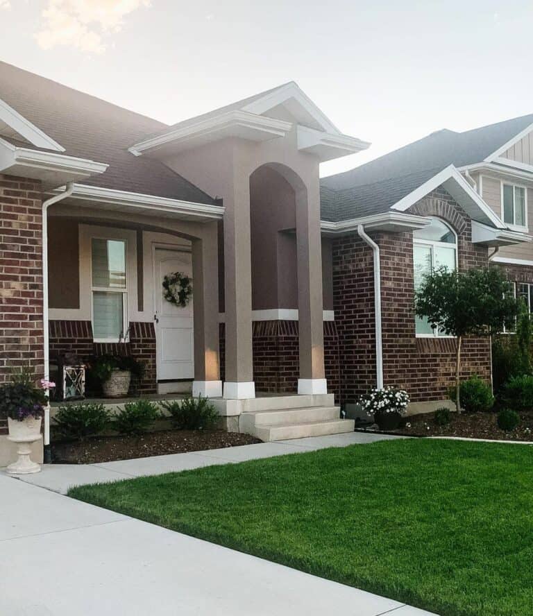 Gabled Portico Joined to Stucco Pillars