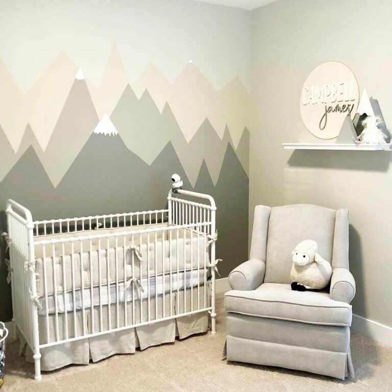 Gray Baby Boy's Nursery With Mountain Mural