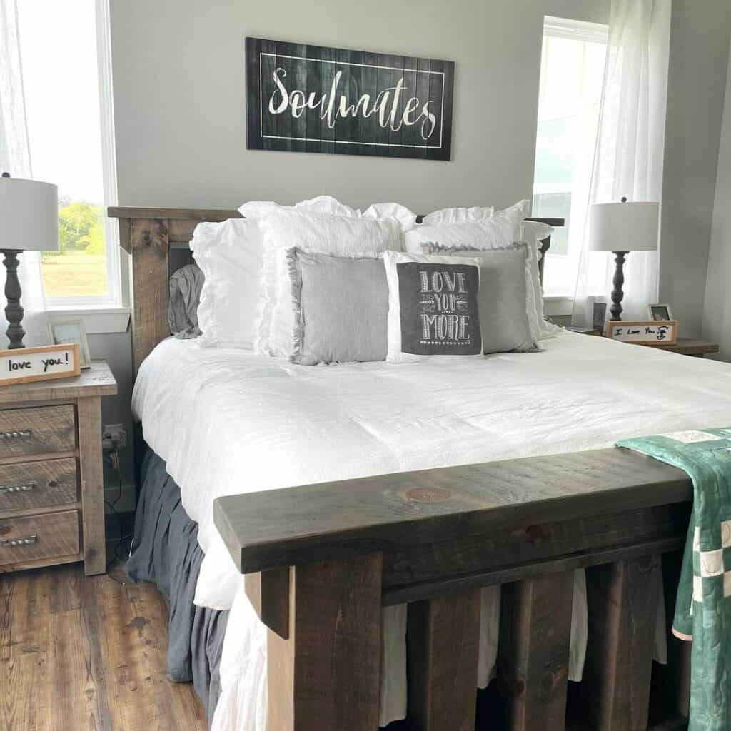 Gray Bedroom With Stained Wood Farmhouse Bed