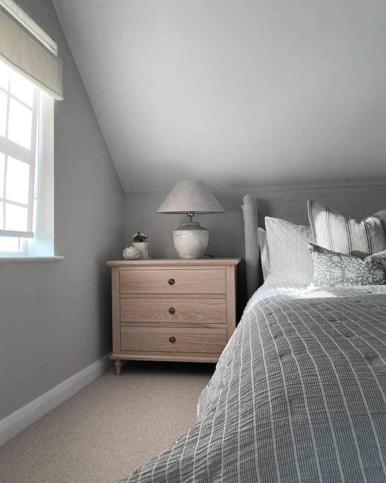 Gray Bedroom With Wooden Nightstand