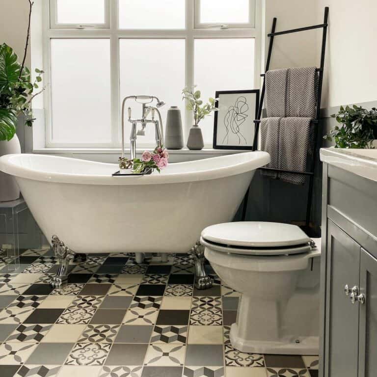 Gray and White Bathroom With Patterned Floor Tiles