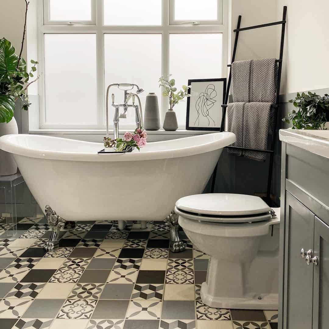 Gray and White Bathroom With Patterned Floor Tiles - Soul & Lane