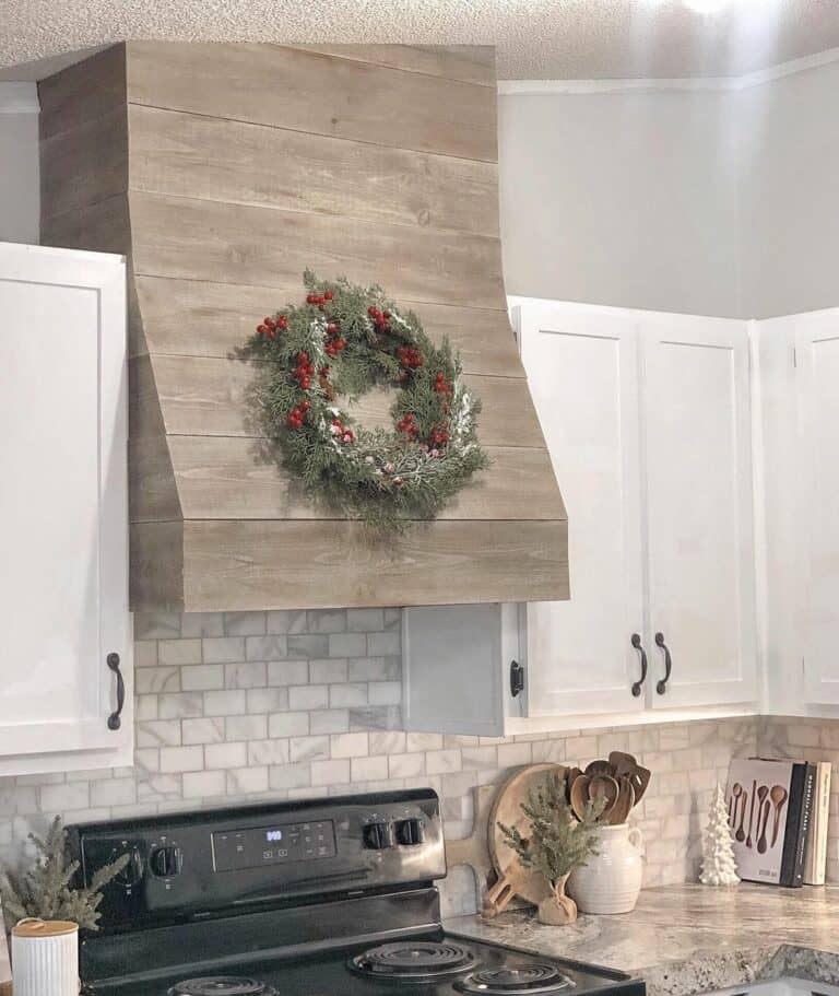 Gray and White Kitchen With Christmas Wreath