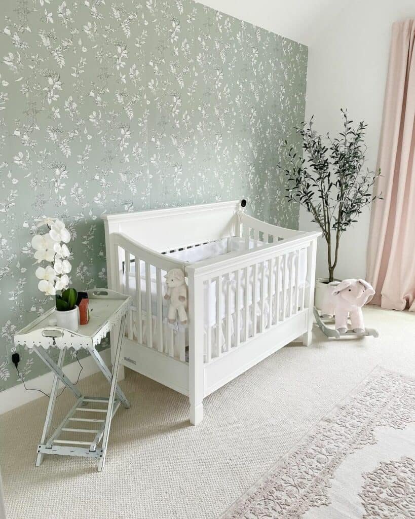 Green and White Floral Accent Wall in Nursery