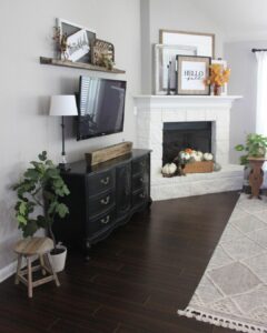 Jet Black Console Table and White Fireplace