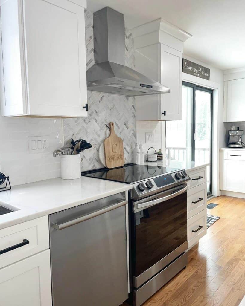 Kitchen Backsplash With White and Gray Herringbone Accent Wall