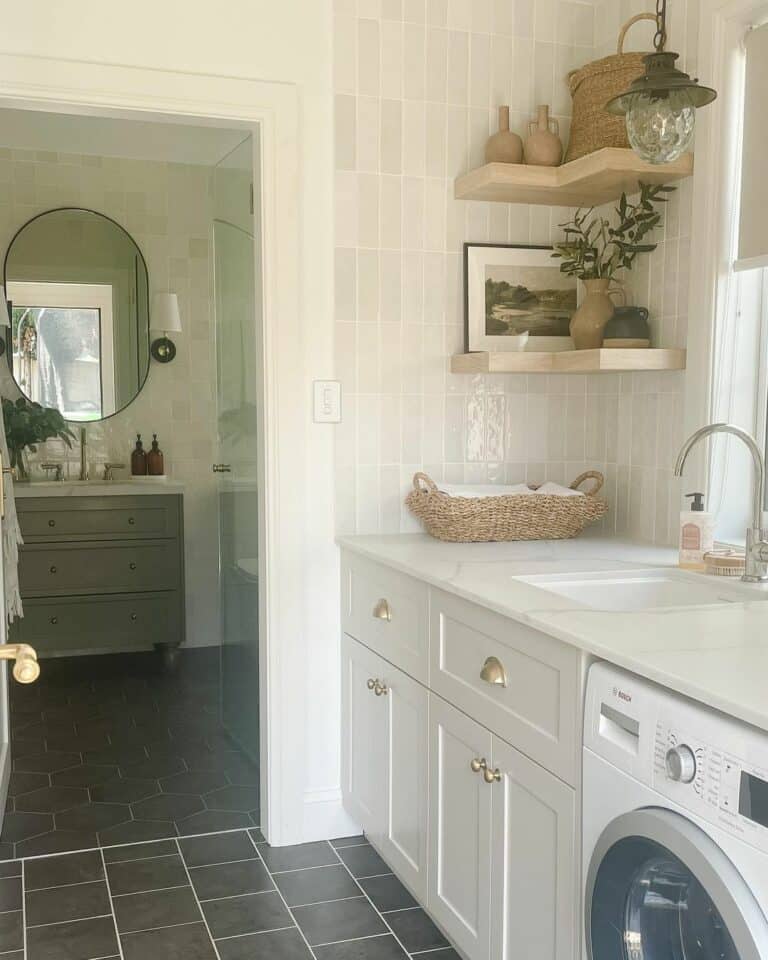 Laundry Room Showcases a Glossy Tile Backsplash