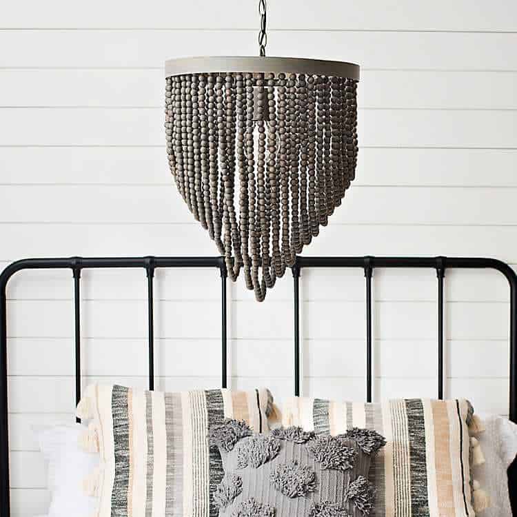 Low-hanging Chandelier Over a Bed