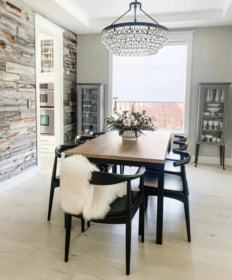 Luxurious Rustic Dining Room With Glass Chandelier