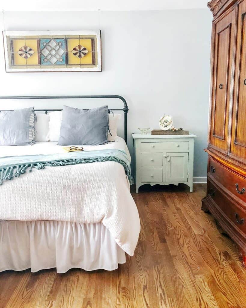 Master Bedroom With Mint Green Nightstand