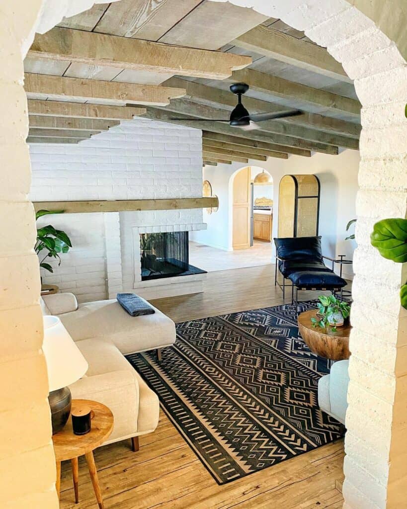 Modern Bohemian Living Room With White Brick