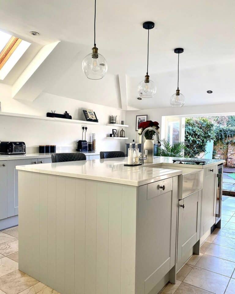 Modern Kitchen With Glass Pendant Lamps
