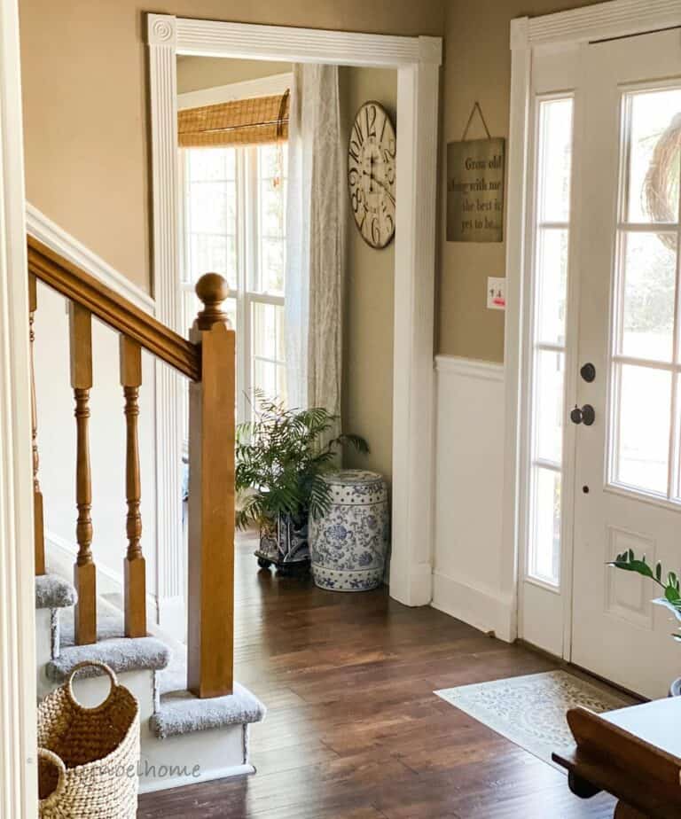 Natural Wood Flooring and Two-toned Walls in Entryway