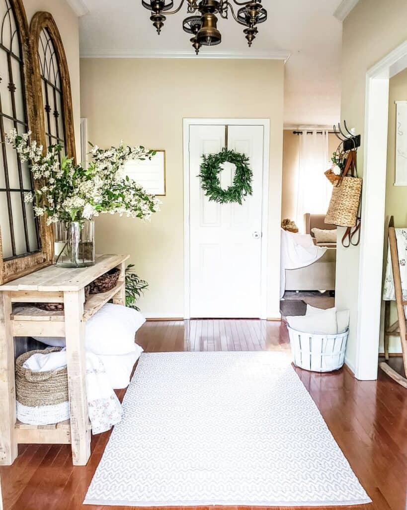 Natural Wood Flooring and White Wooden Table in Entryway