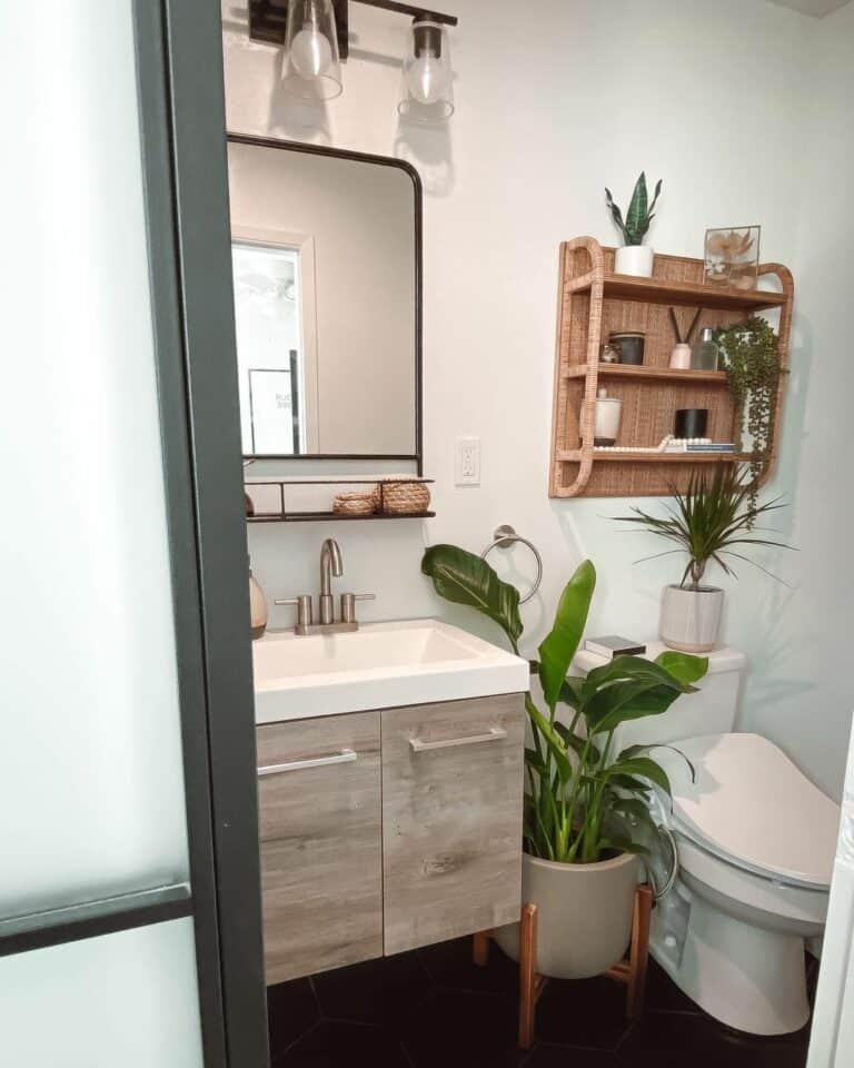 Neutral Bathroom With Rattan Shelf and Plants