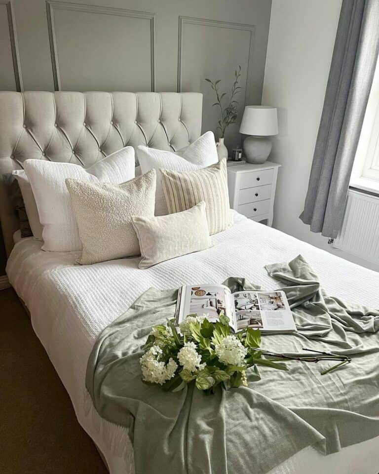 Neutral Bed With White Pillows With Gray Accent Wall