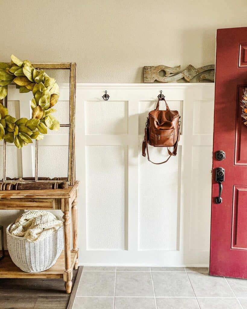 Neutral Gray Floor Tiles With Red Front Door