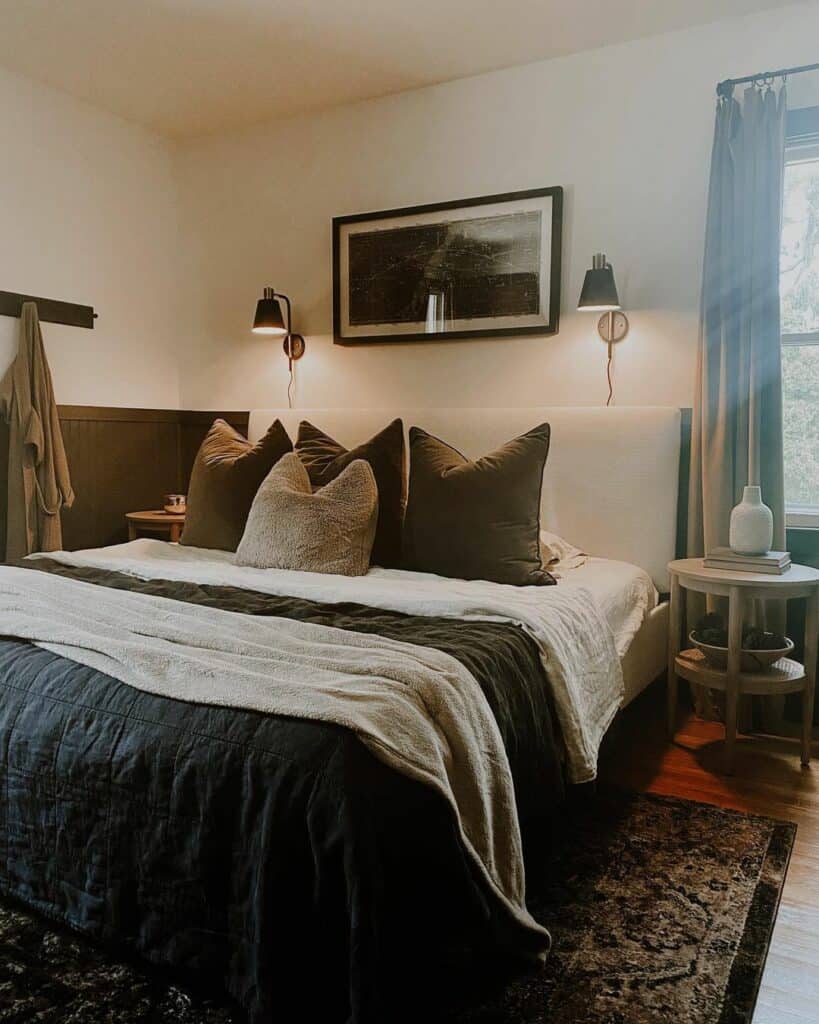 Neutral Masculine Room With Black and Gold Sconces