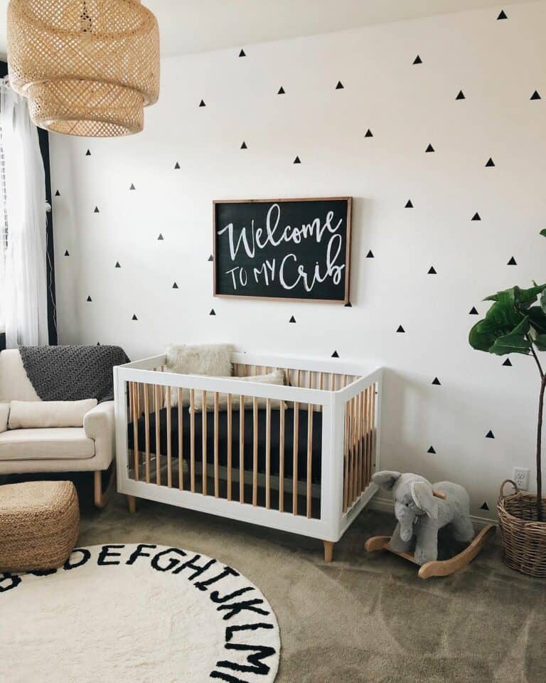 Neutral Nursery With Black and White Accent Wall