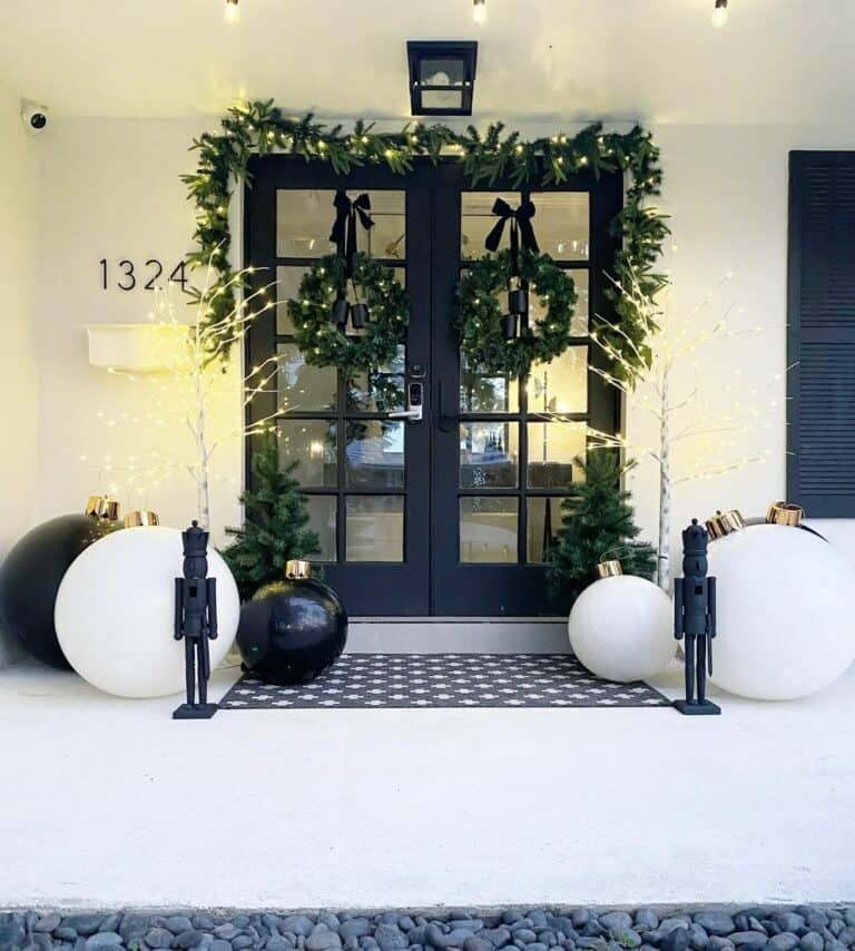 Porch With Oversized White and Black Ornaments