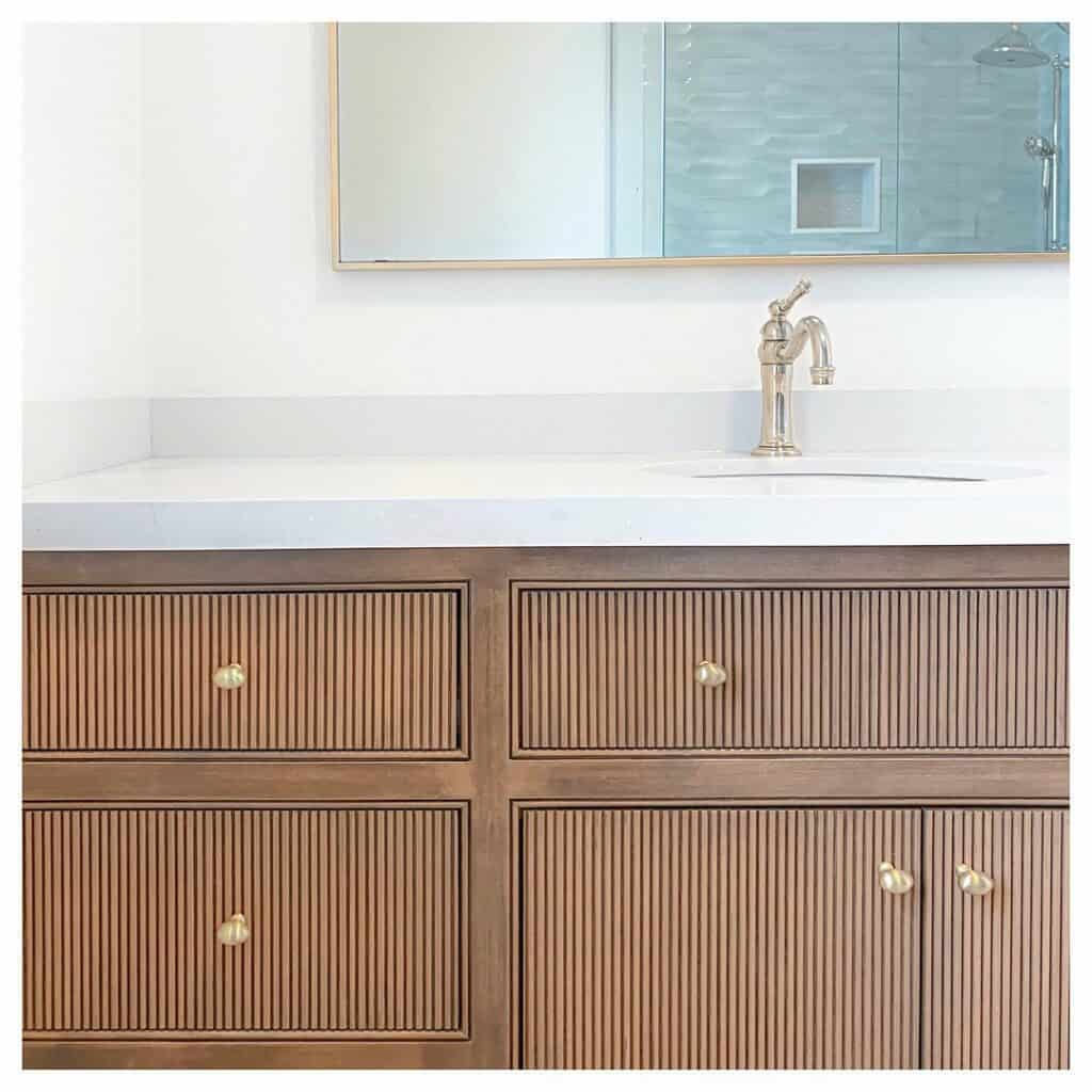 Reeded Cabinets Draw Attention to the Vanity