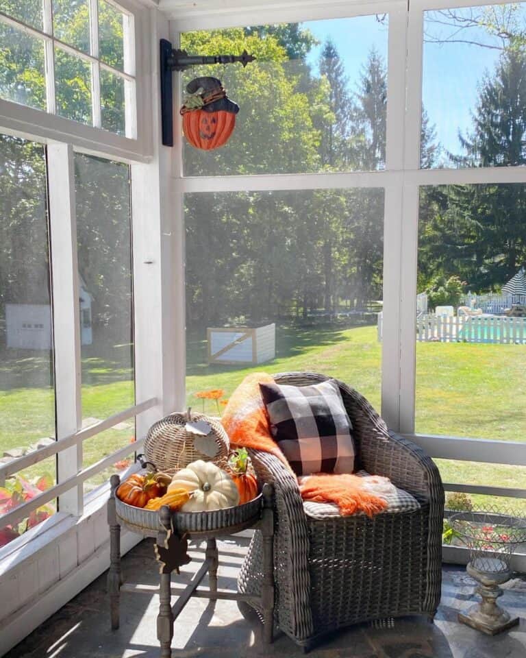 Rustic Screened-in Porch With Fall Décor