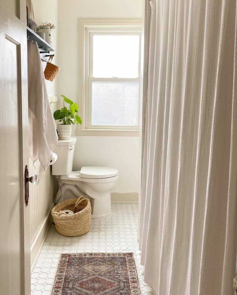 Simple Farmhouse Bathroom With White Shower Curtains