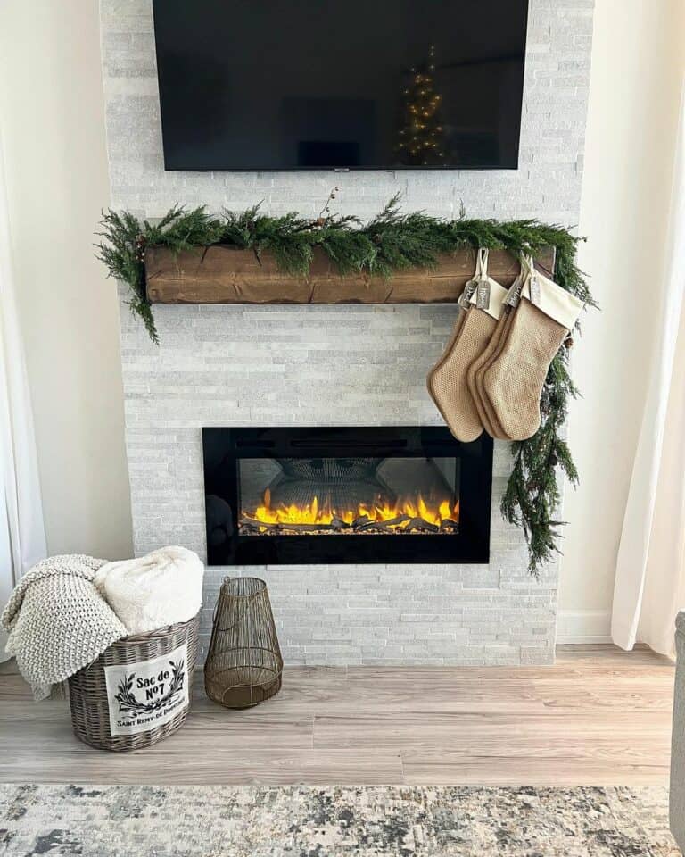 Simple Stockings Strung Along a Fireplace Mantel