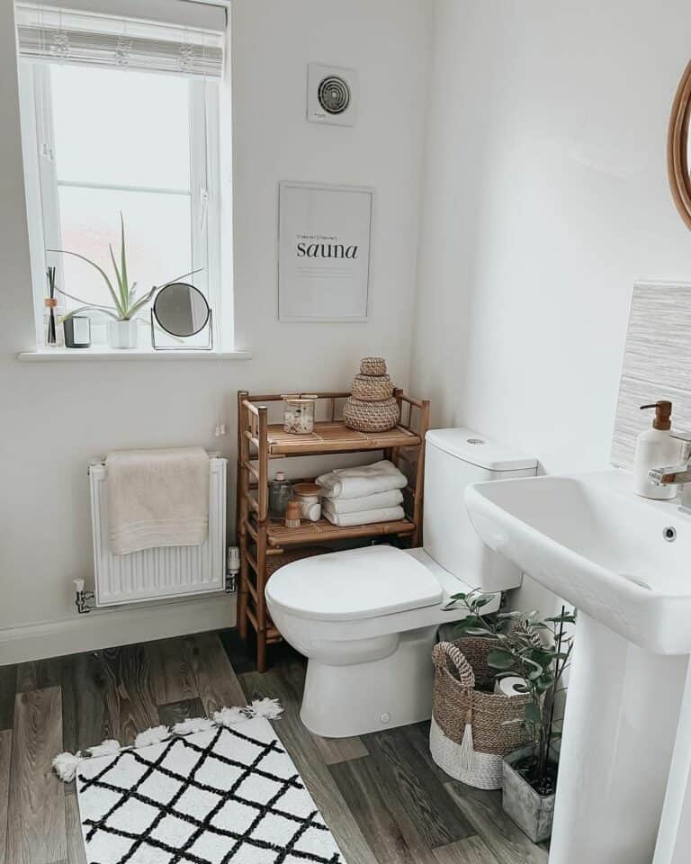 Simple White Bathroom With Wooden Shelf