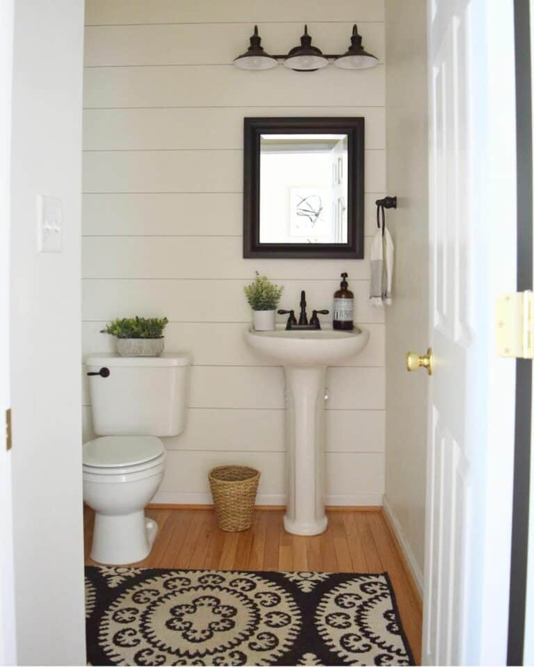 Small Farmhouse Bathroom Design With White Shiplap Walls
