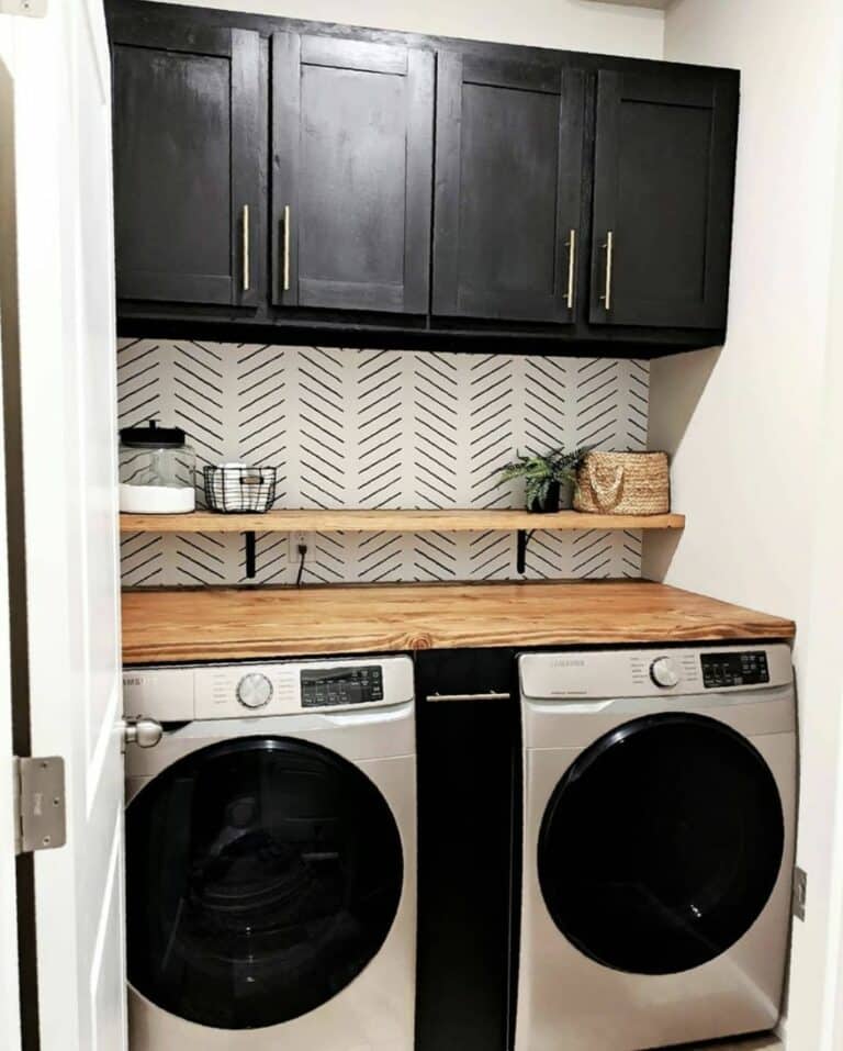 Small Laundry Room With Black Wood Cabinets