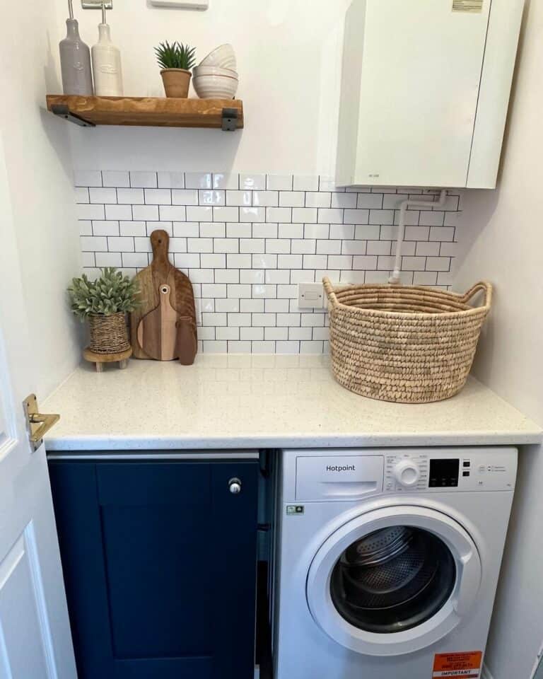 Small Utility Room With White Subway Tile Backsplash