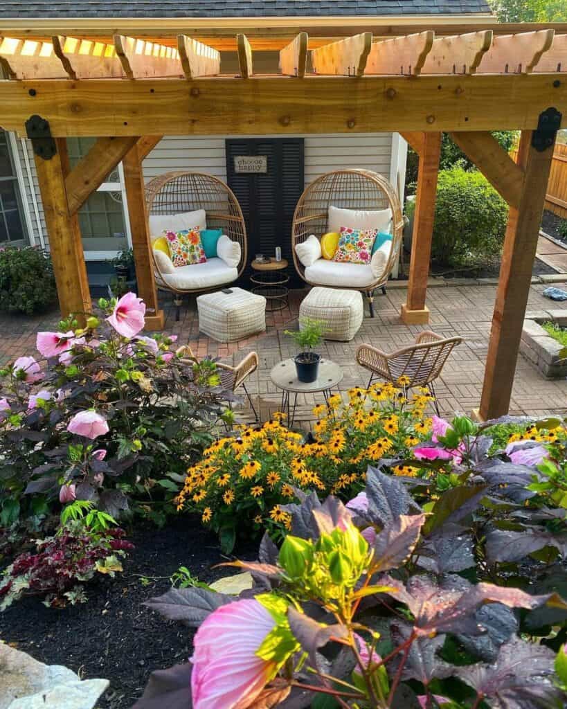 Stained Wood Pergola With Rattan Patio Chairs