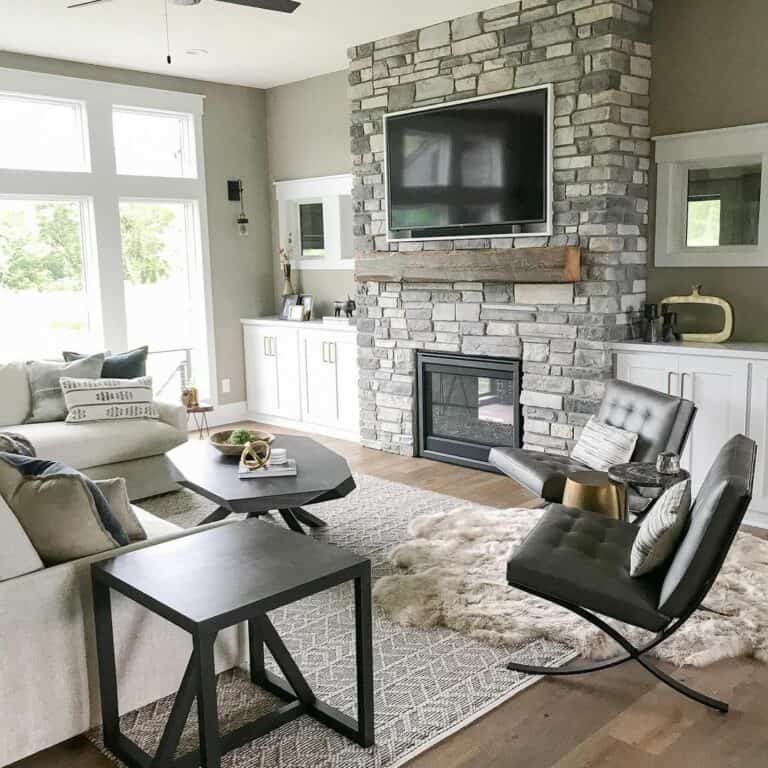 Stone Fireplace With Light and Dark Contrasting Furniture