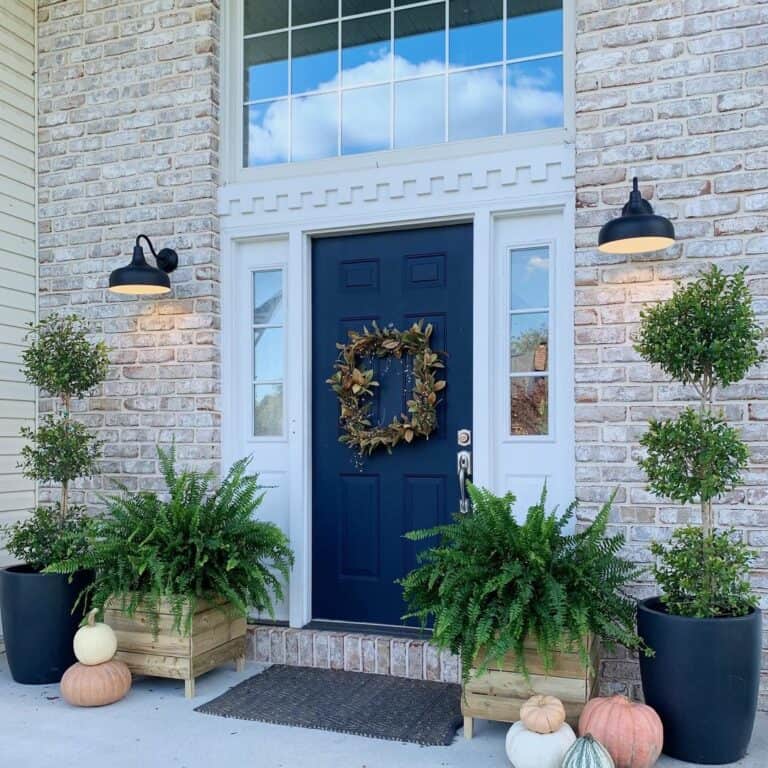 Stone Porch With Black Front Door