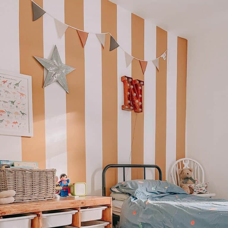 Striped Yellow and White Accent Wall in Kid's Bedroom