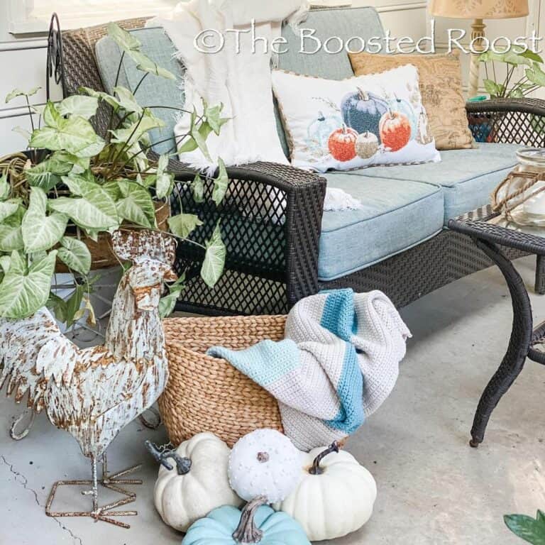 Sunroom With White and Blue Decorative Pumpkins