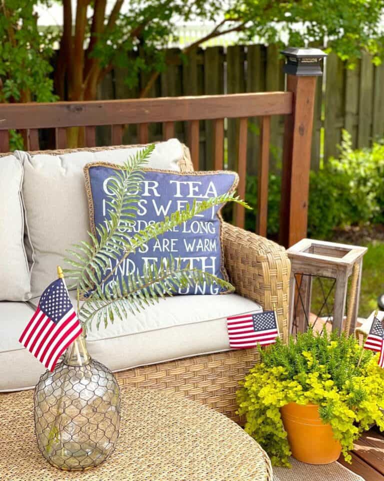 Tan Rattan Patio Furniture With 4th of July Décor