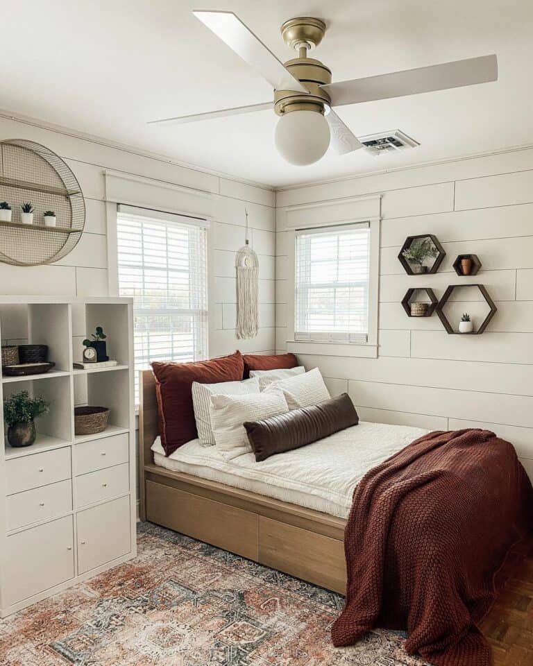 Tenage Bedroom With White and Gold Ceiling Fan