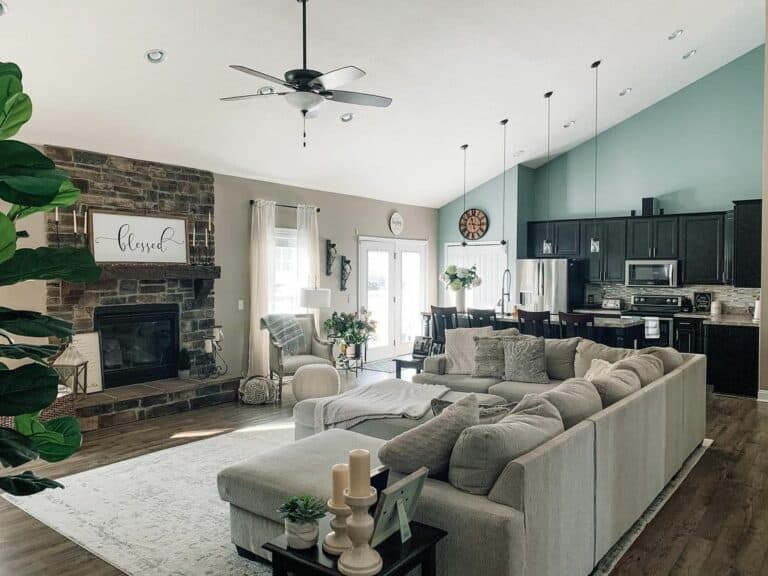 Vaulted Farmhouse Living Room With Stone Fireplace