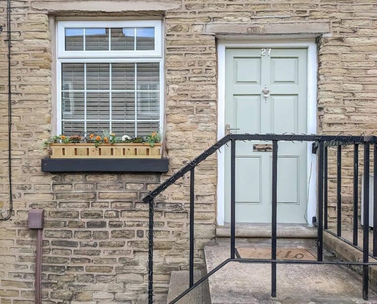 Walk-up Doorway With Black Railing