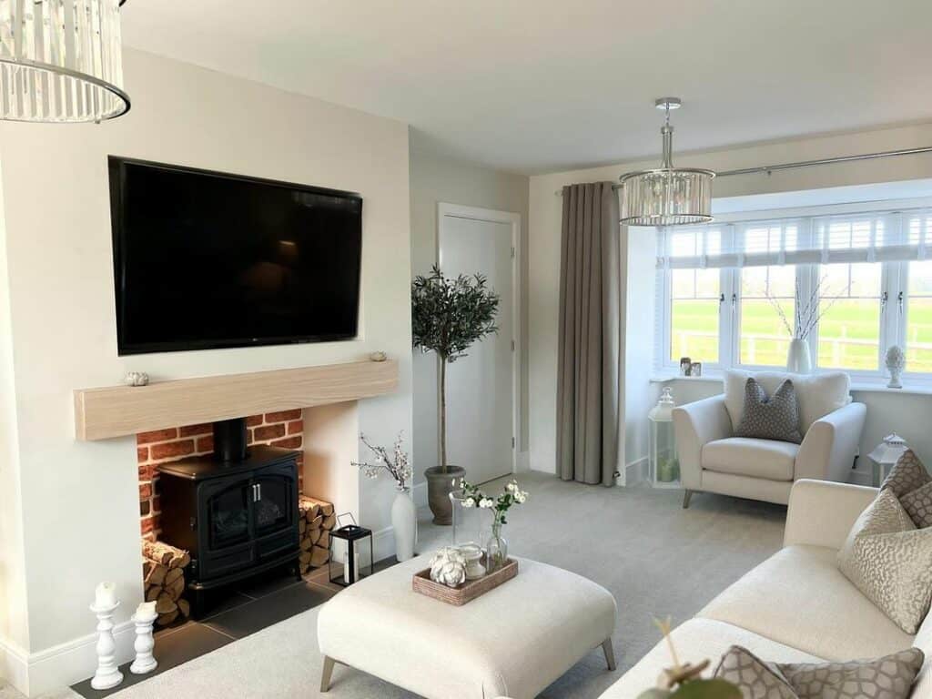 Warm Greige Living Room With Brick Hearth