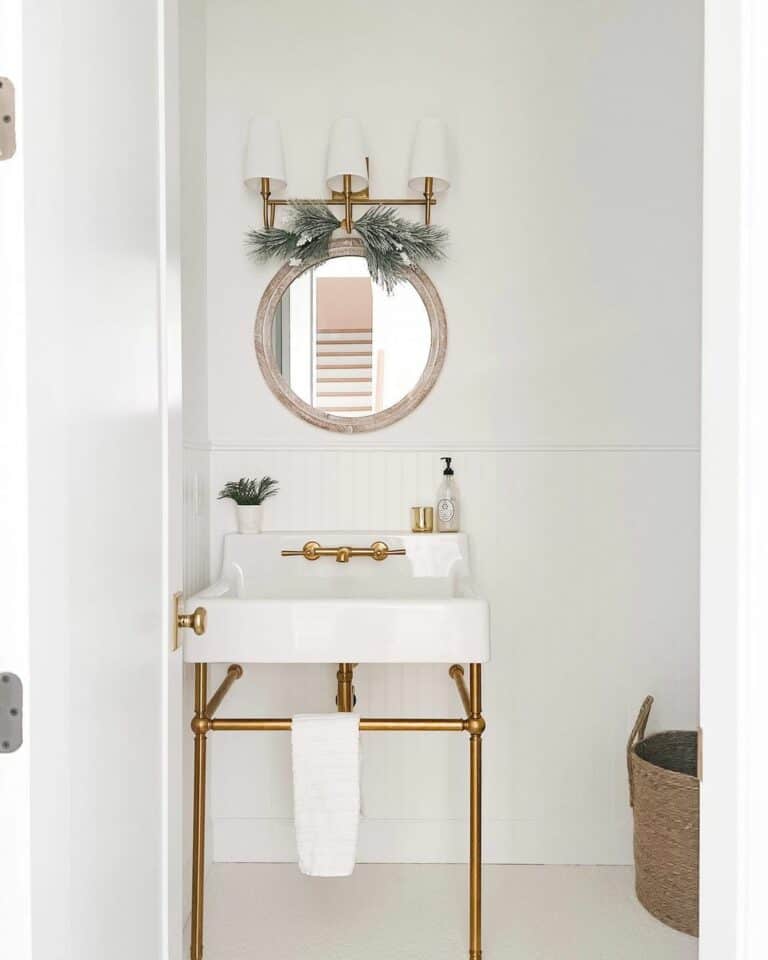 White Bathroom Wainscoting with Brass Accents