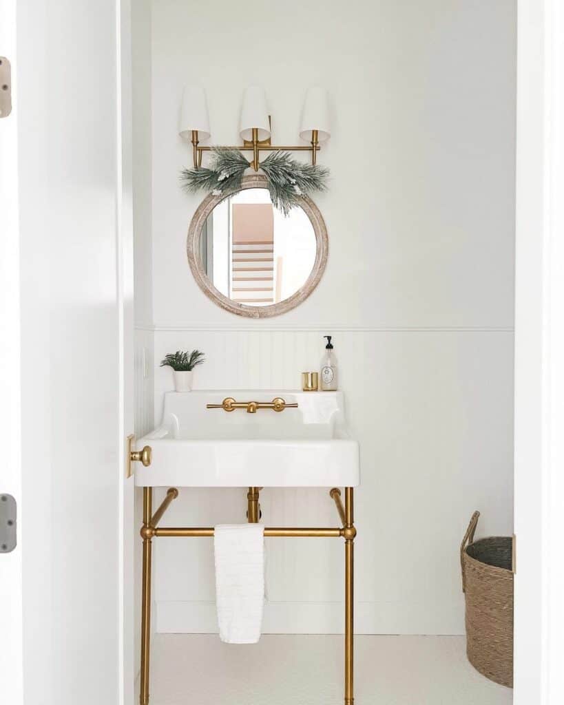 White Bathroom Wainscoting with Brass Accents