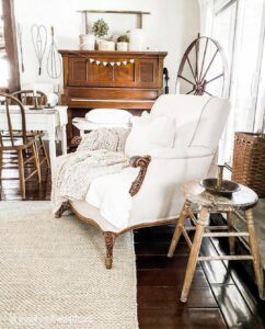 White Corner Chair on Dark Wood Flooring