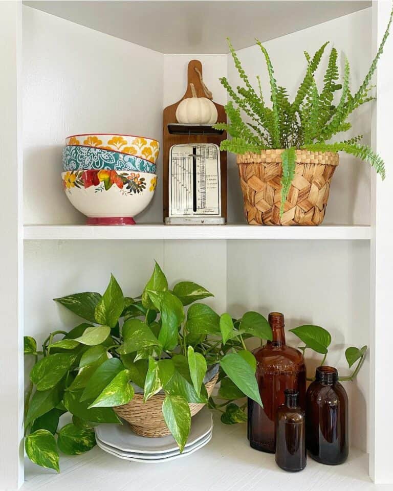 White Corner Shelf With Greenery Décor